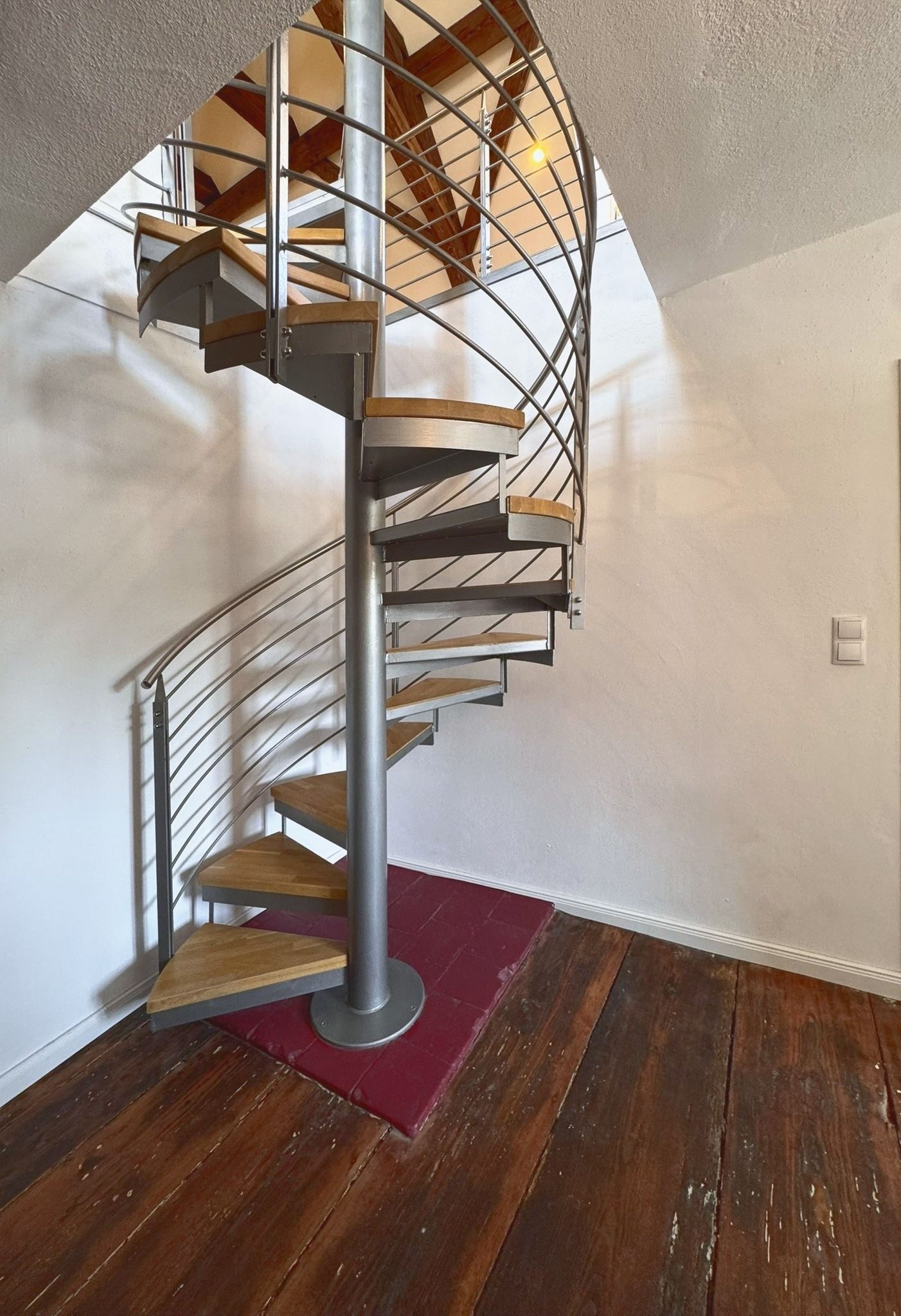 Wendeltreppe zur Galerie unterm Dach